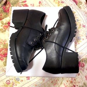 Black platform loafers